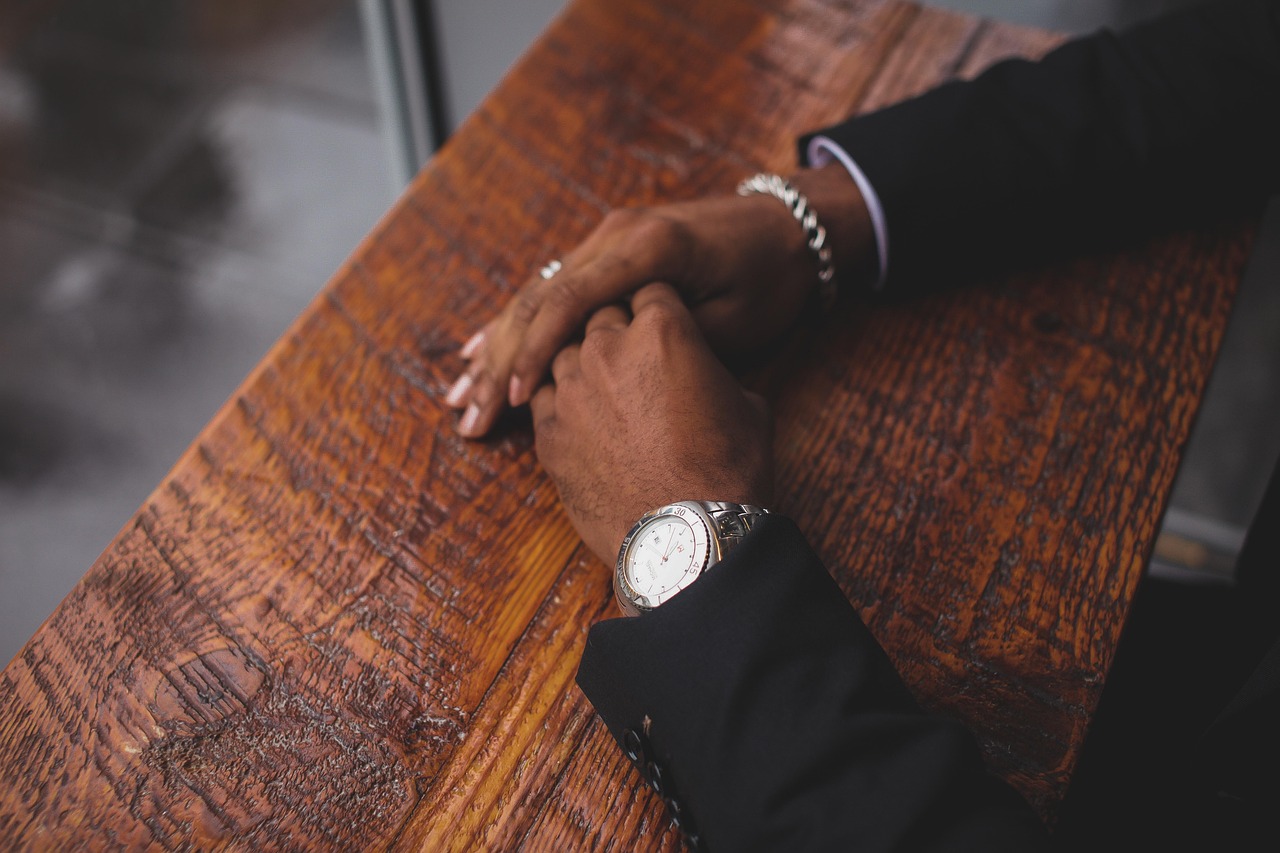 Business, hands, wristwatch — The Role of RNG in Slot Machines